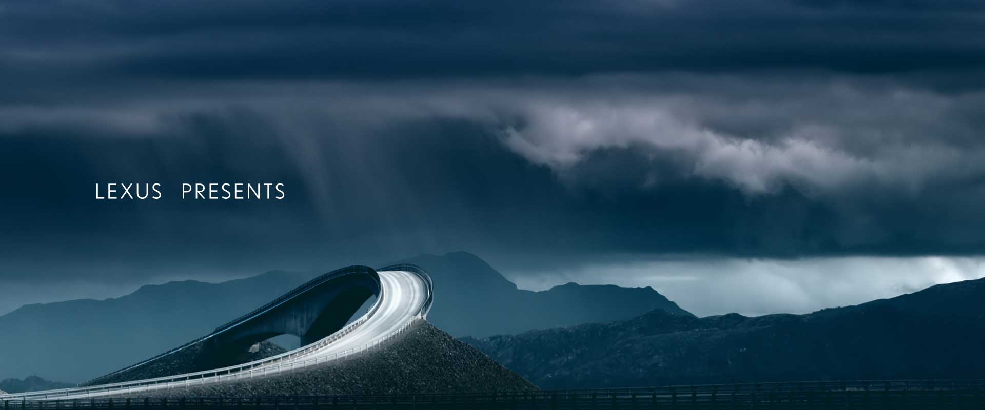 Very scenic road with clouds. Still from Lexus Commercial.