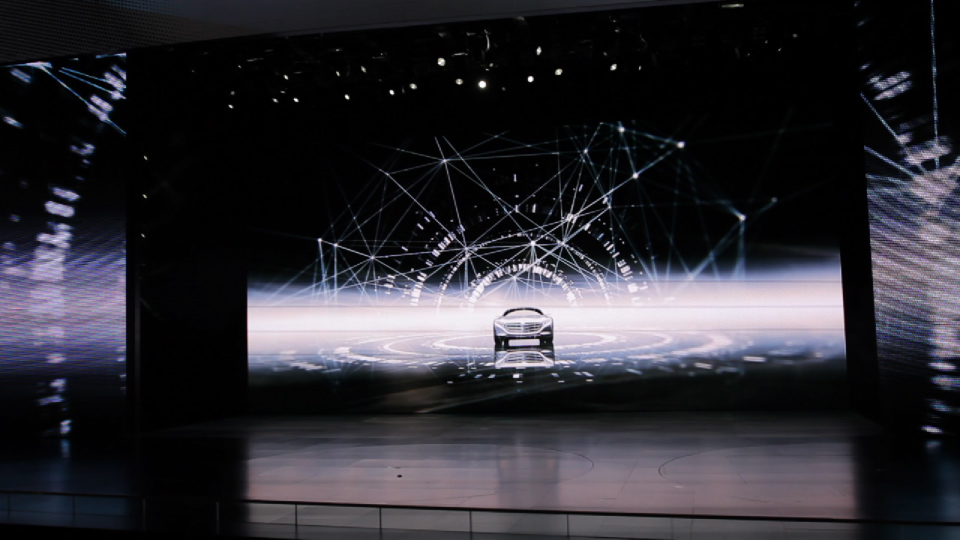 Car driving on stage. Mercedes-Benz IAA 2011 Trade Show