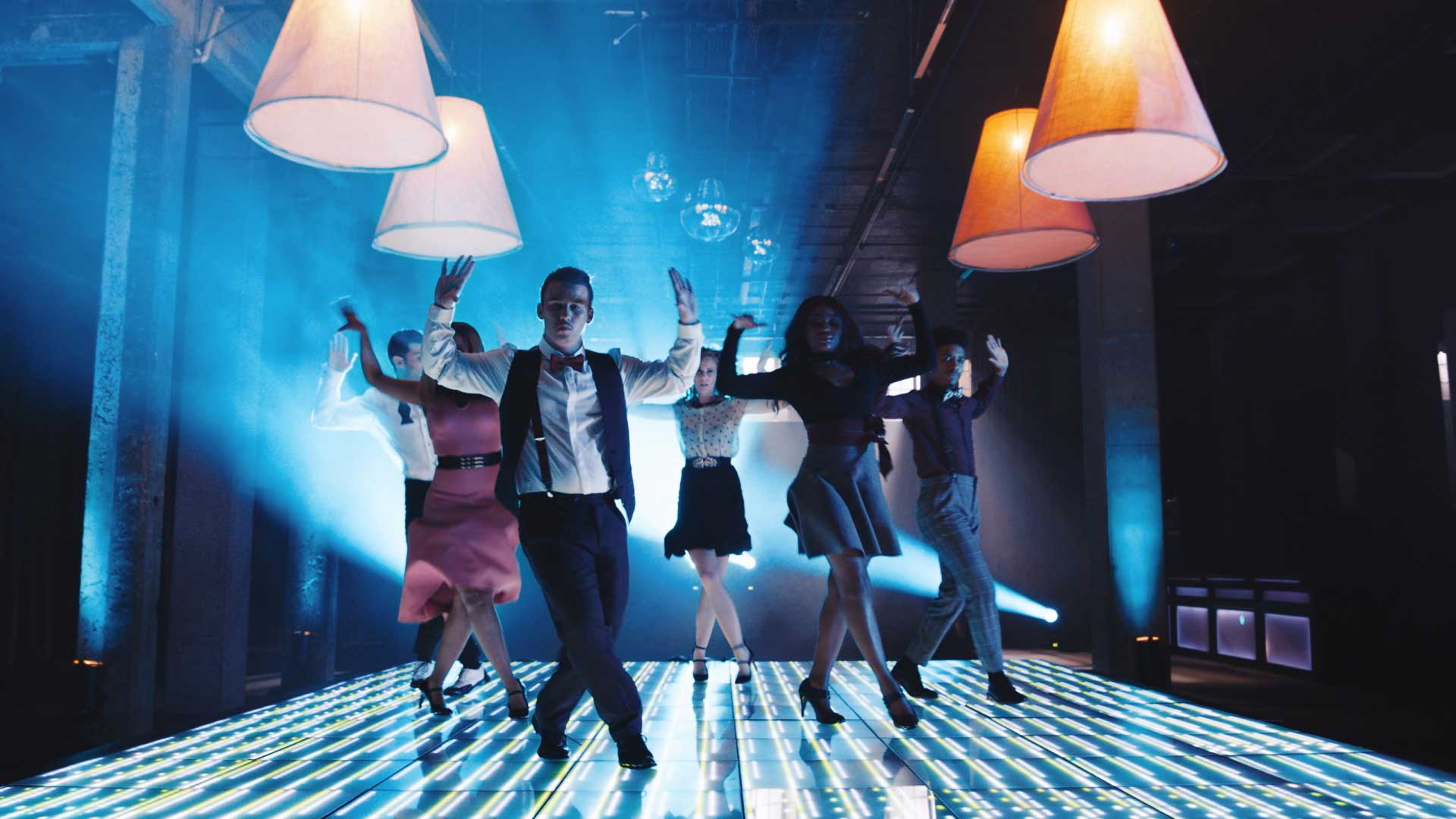 Dancing on stage. Still from Toyota Yaris commercial.